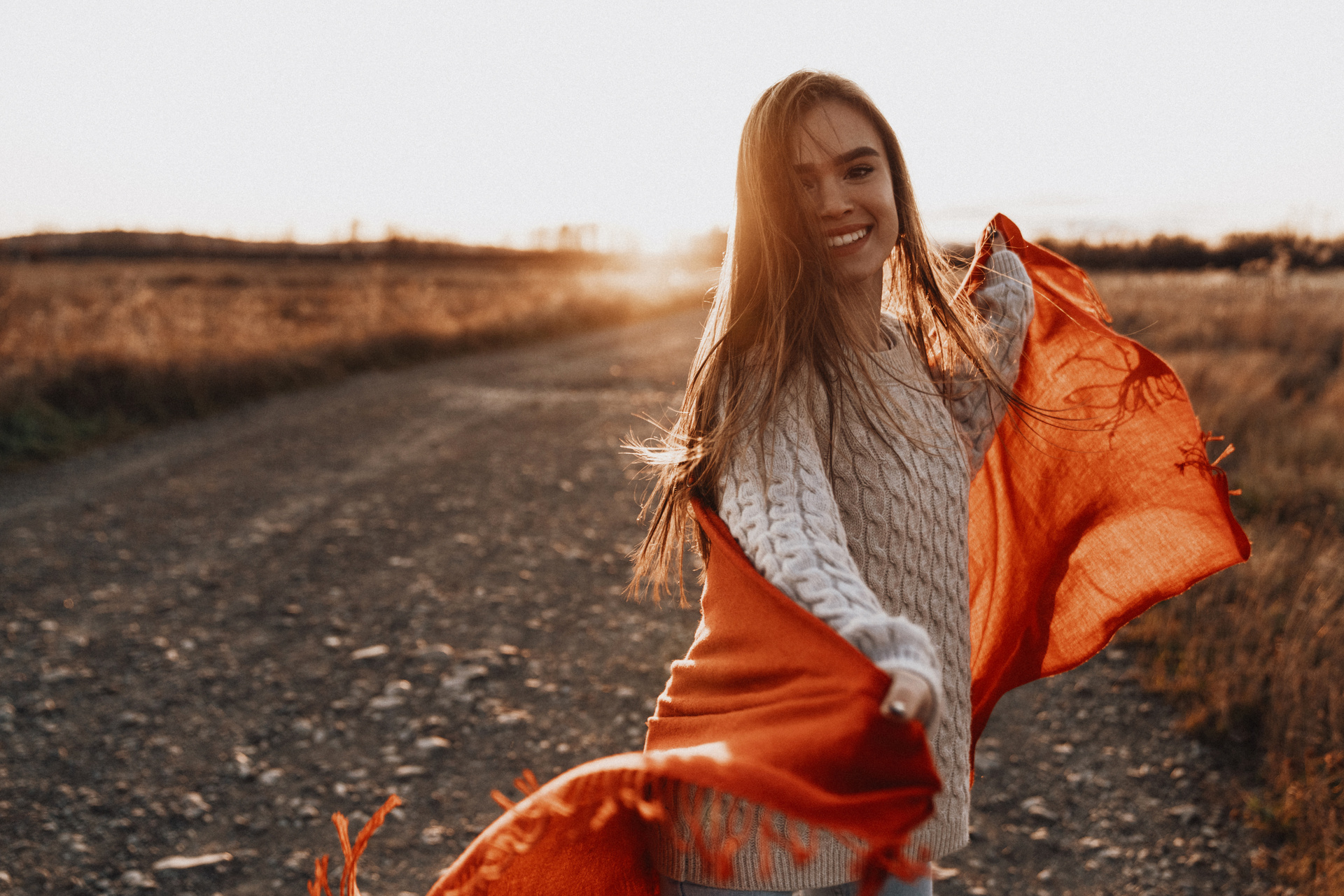 Happy Woman Holding a Scarf